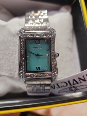 Invicta Women's Silver Watch with Turquoise Dial